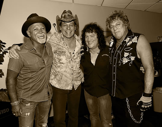 l to r: Derek St. Holmes, Ted Nugent, Greg Smith, Mick Brown (photo: James & Marilyn Brown)